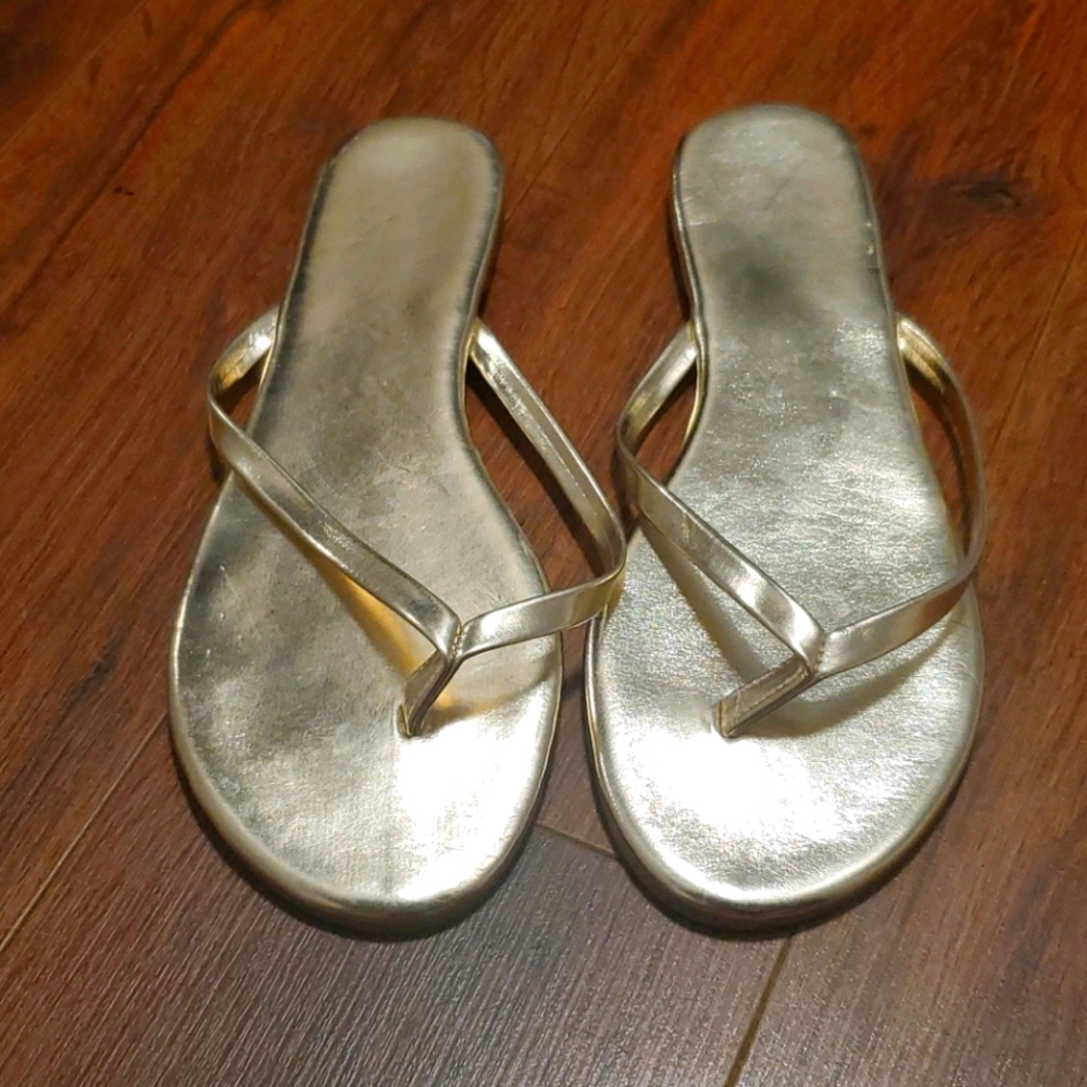 Gold flip flops